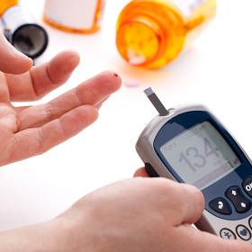 A glucose blood test can be done at home using a glucometer.